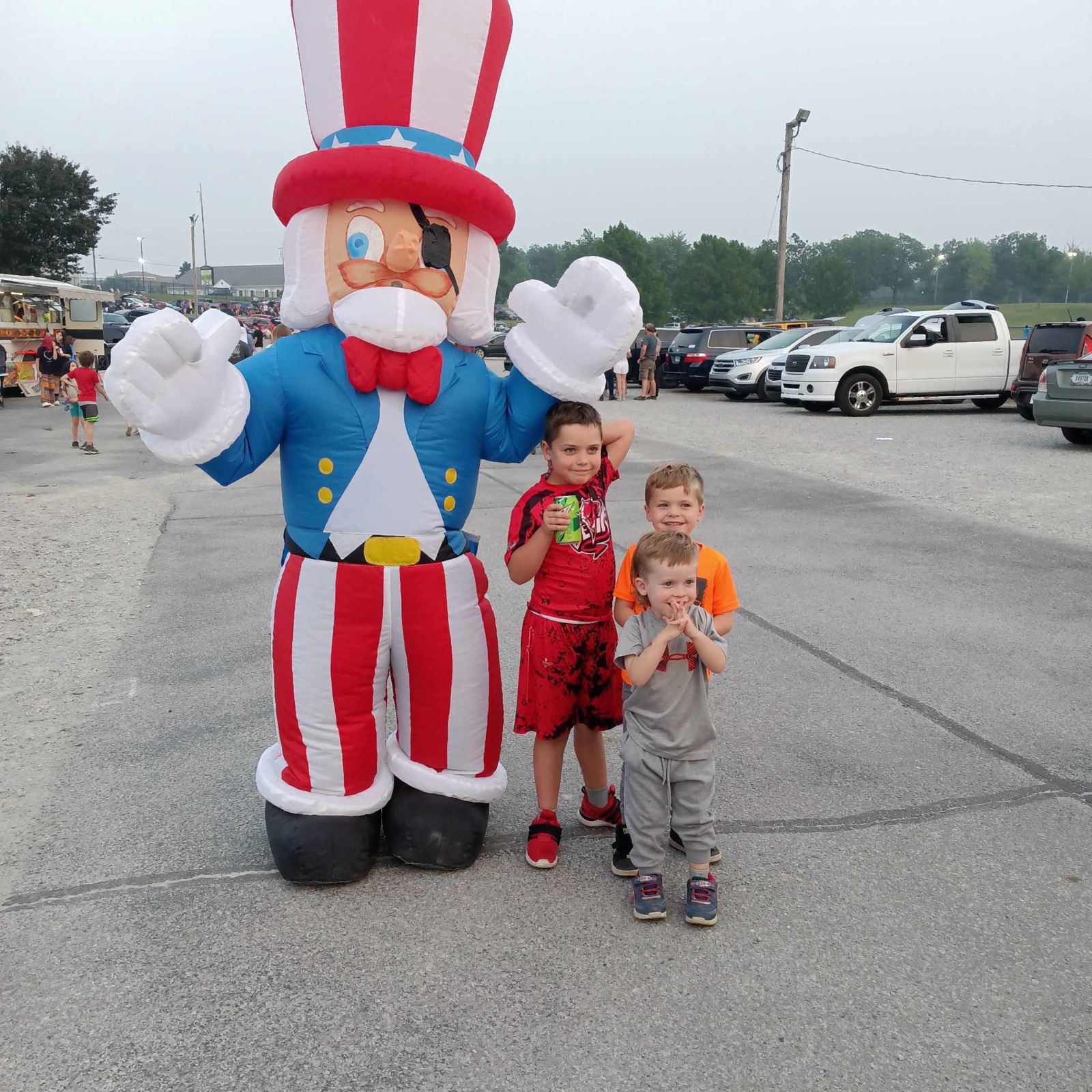 Kids pose with the Uncle Sam mascot at Willy Wednesday