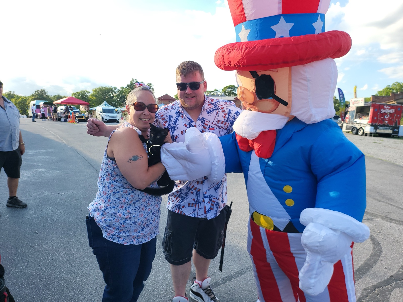 Guests pose with the Uncle Sam mascot at Willy Wednesday